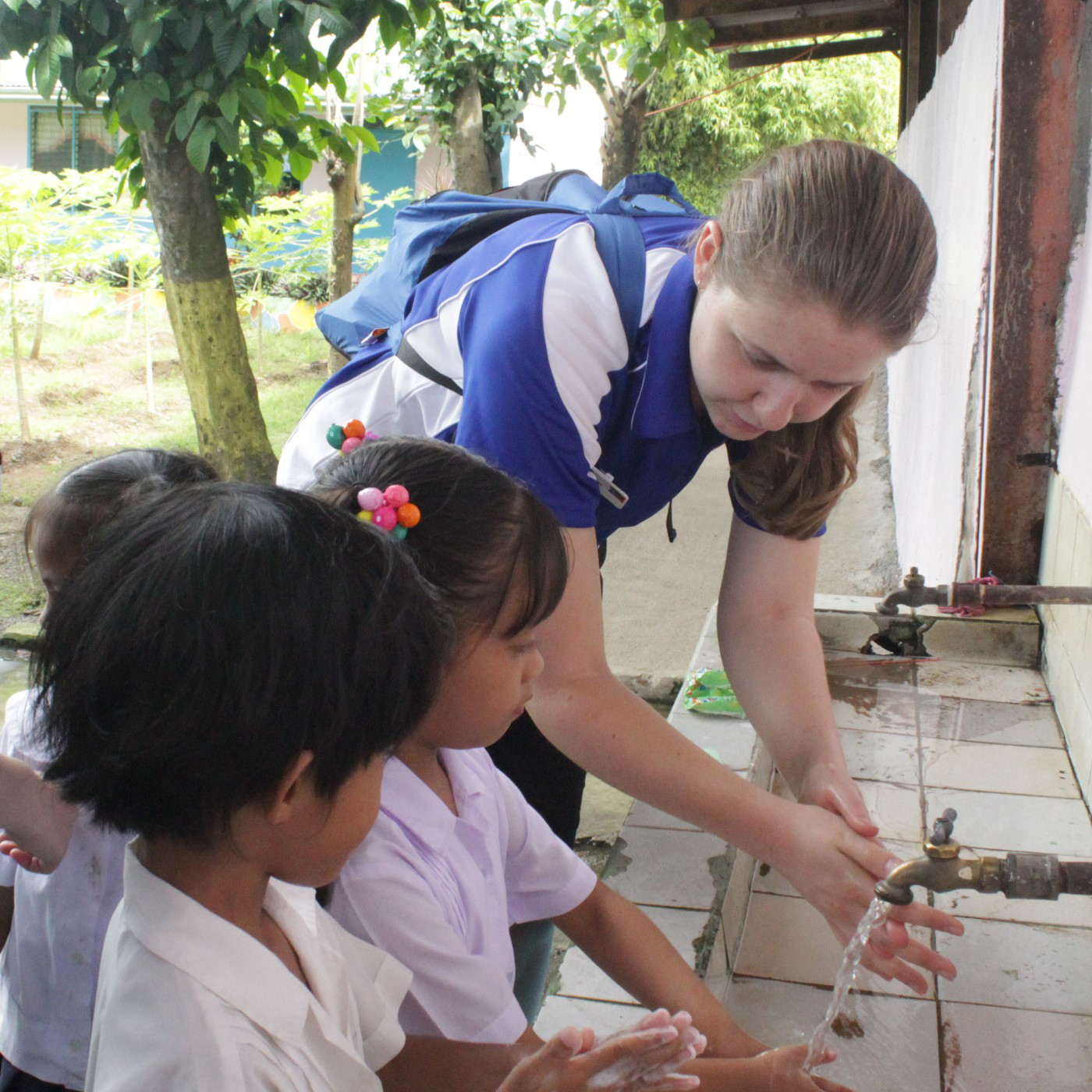 An ECU nursing student providing health teachings during the community immersion.